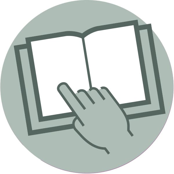 circle image with an illustrated hand pointing to a page in a book