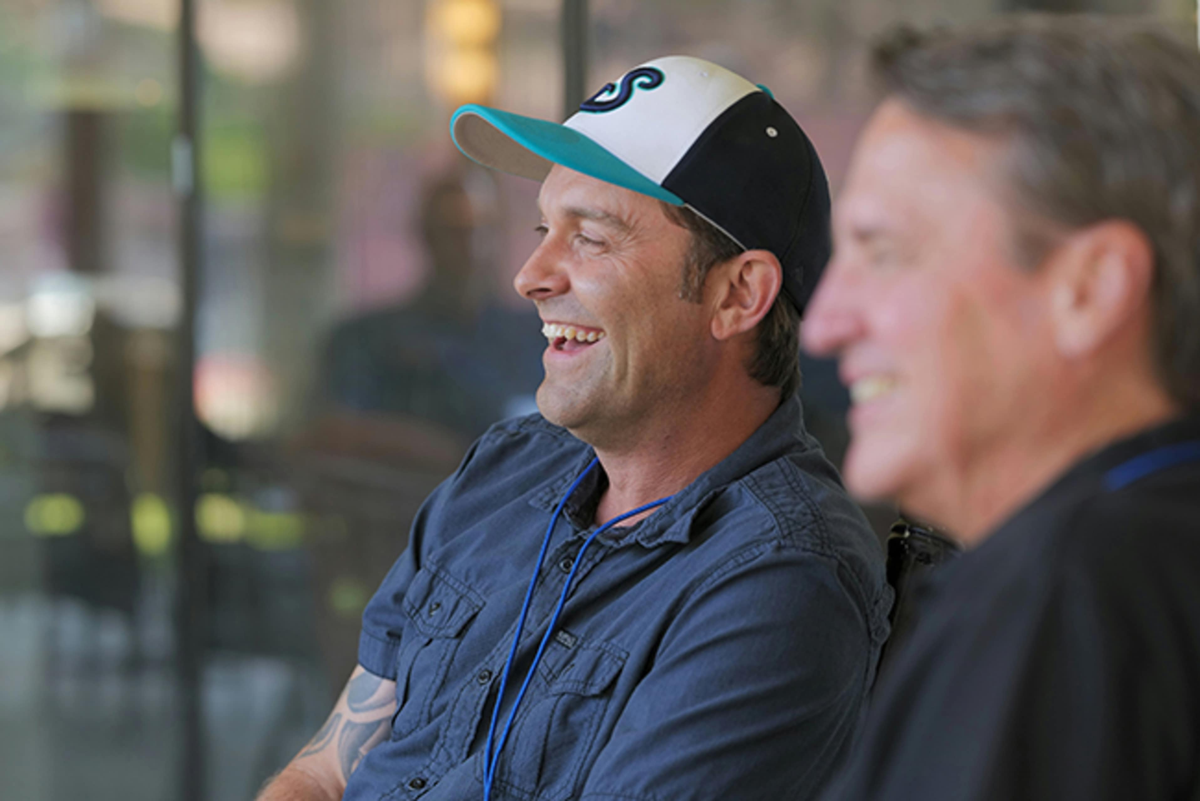 Men laughing outside