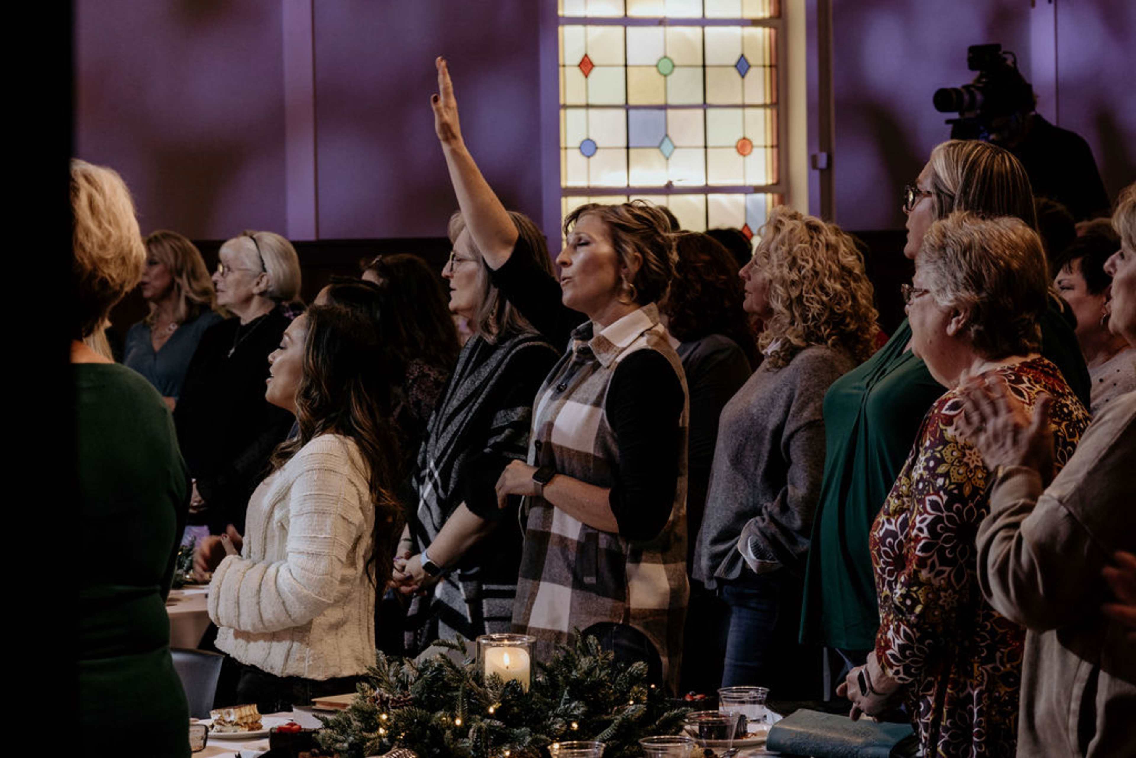 Women singing at Christmas service
