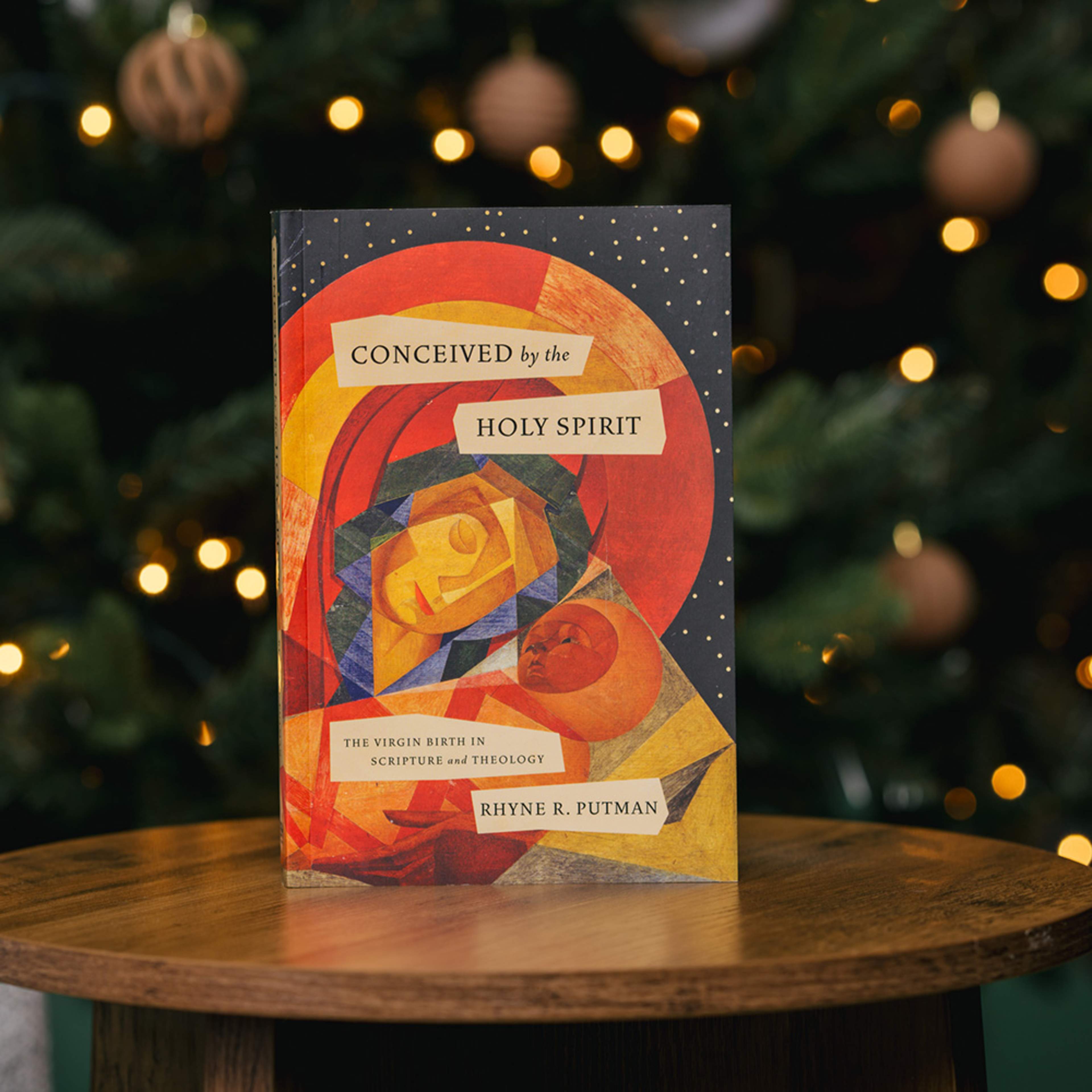 book in front of a Christmas tree