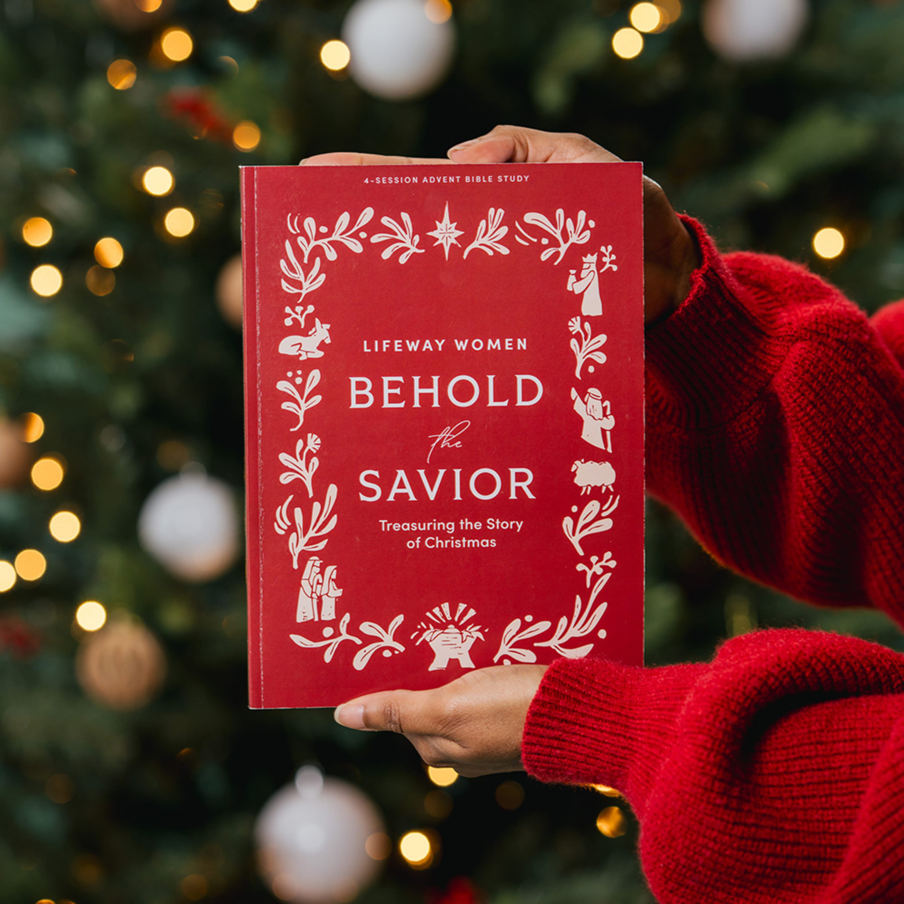 women's Bible study in front of a Christmas tree
