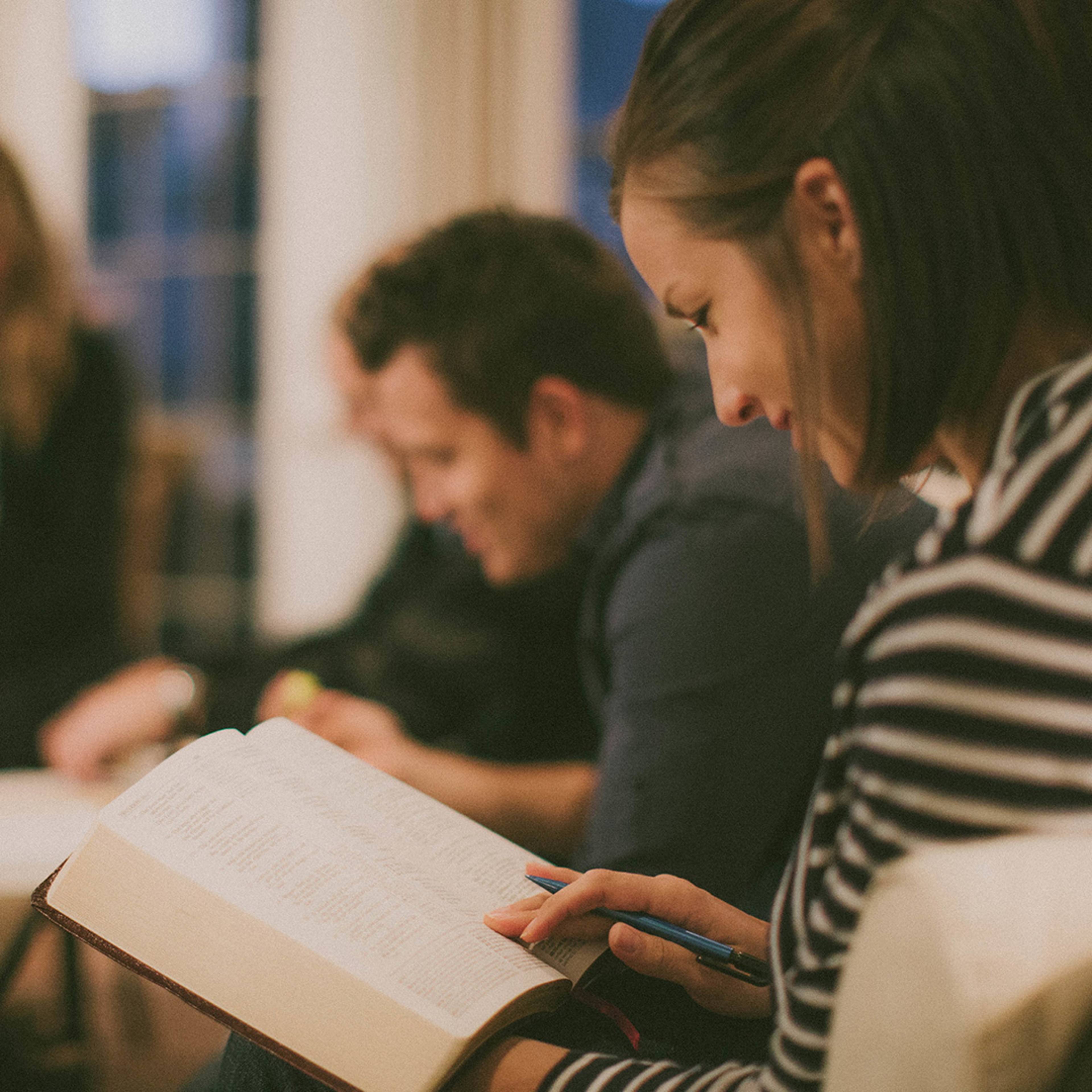 woman and man studying the bible