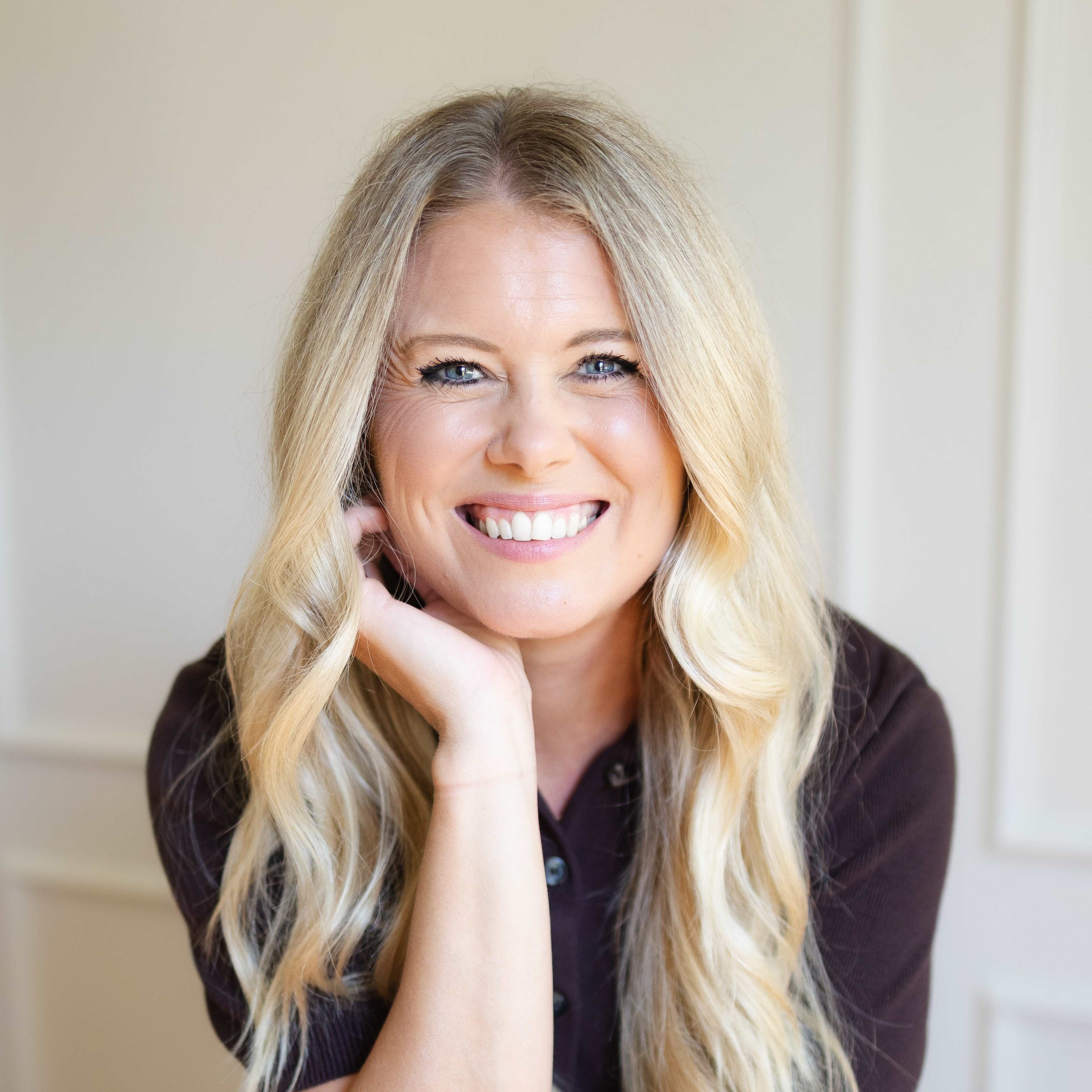Megan Gray portrait with hand on chin