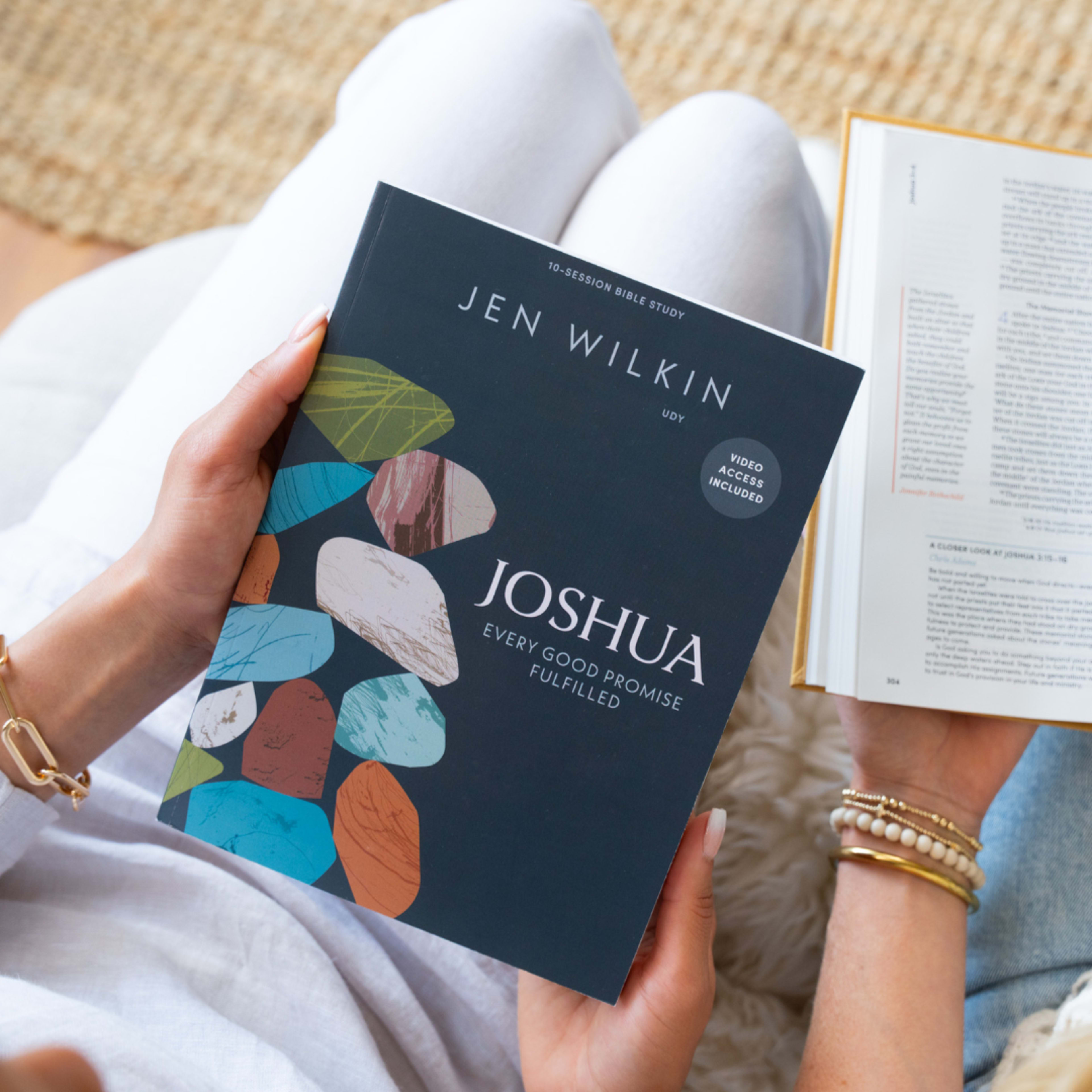 Joshua Bible study in woman's hands