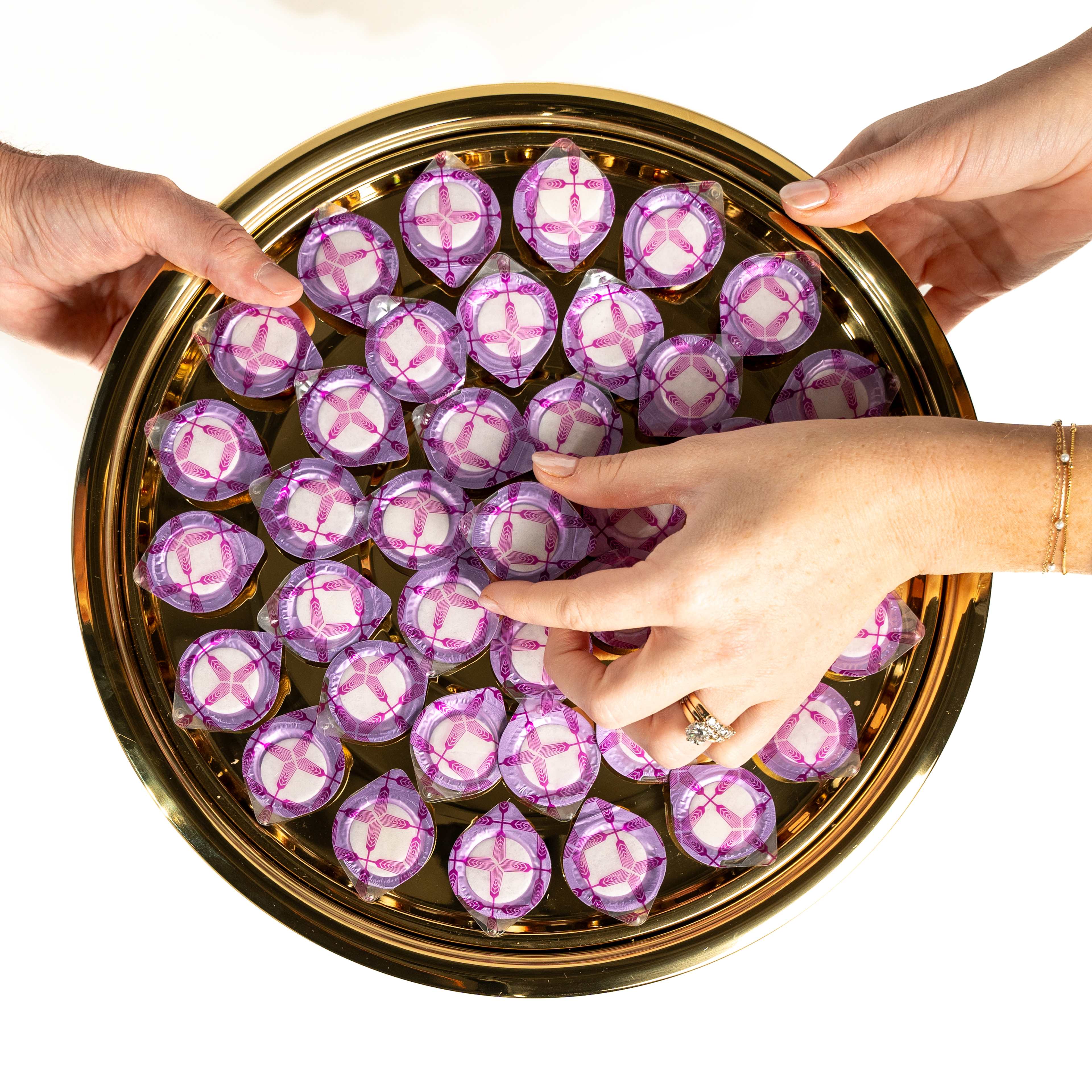 Communion serving tray filled with individually wrapped communion cups