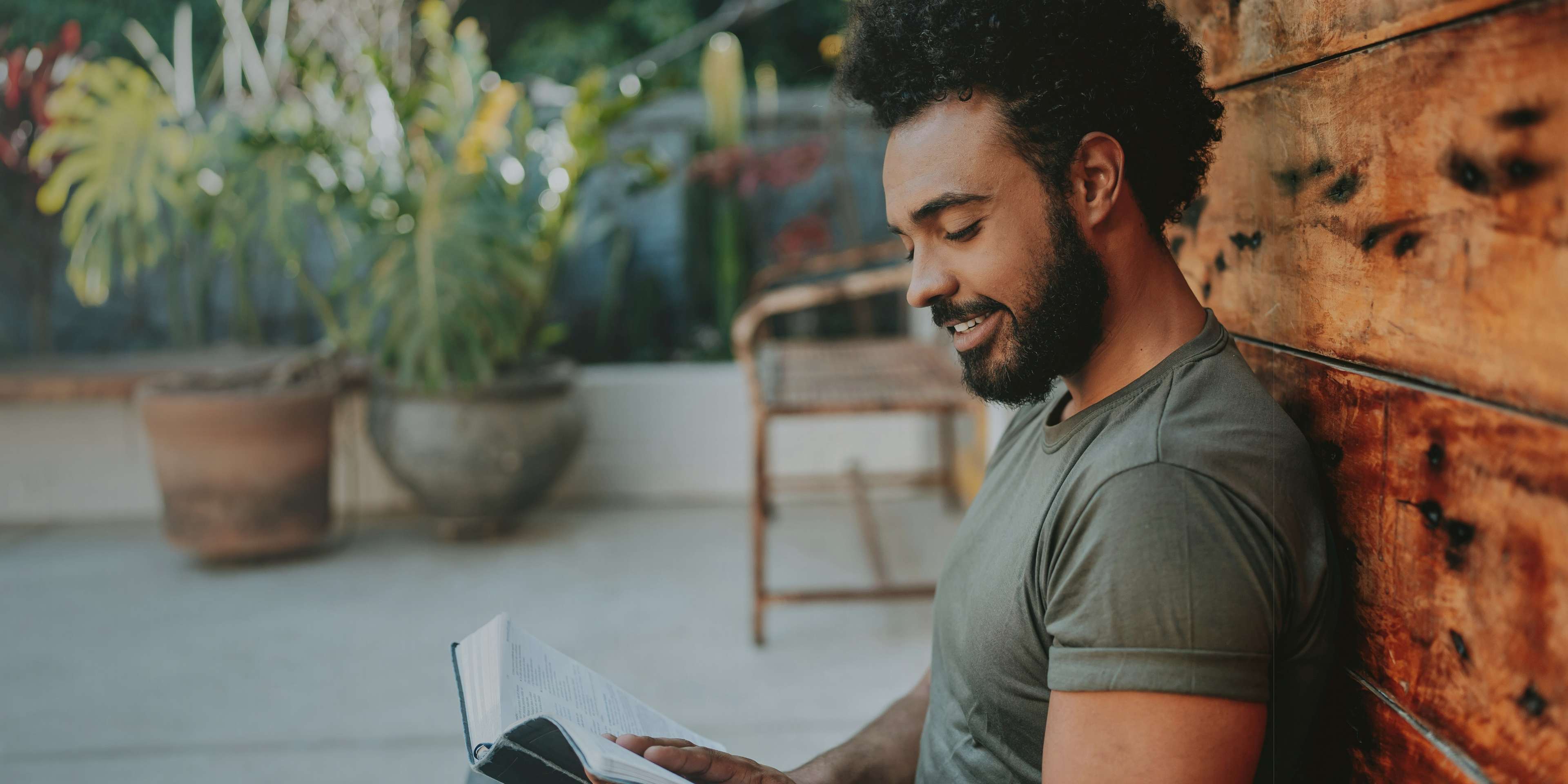 man reading a Bible