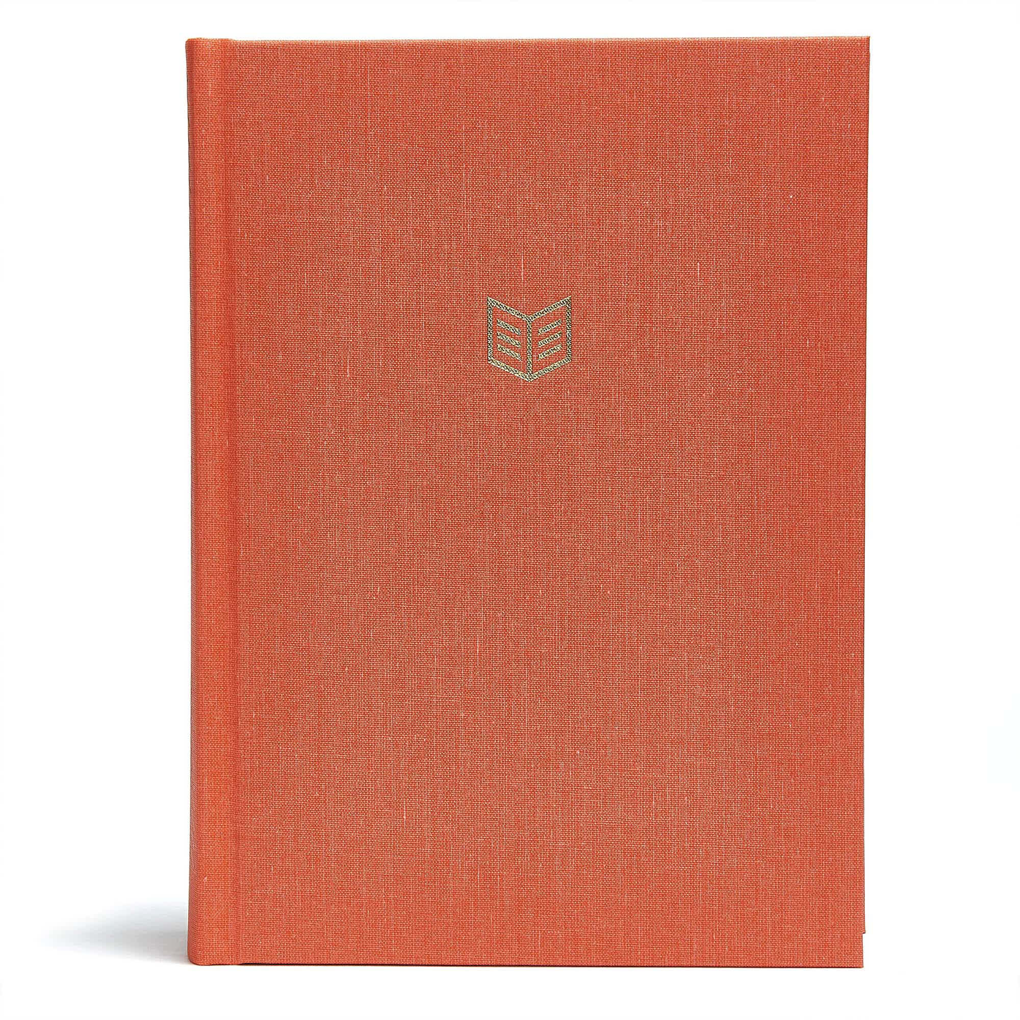 Orange hardcover book with a minimalist logo on the front.