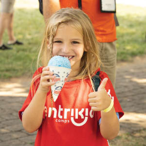 girl eating snow cone
