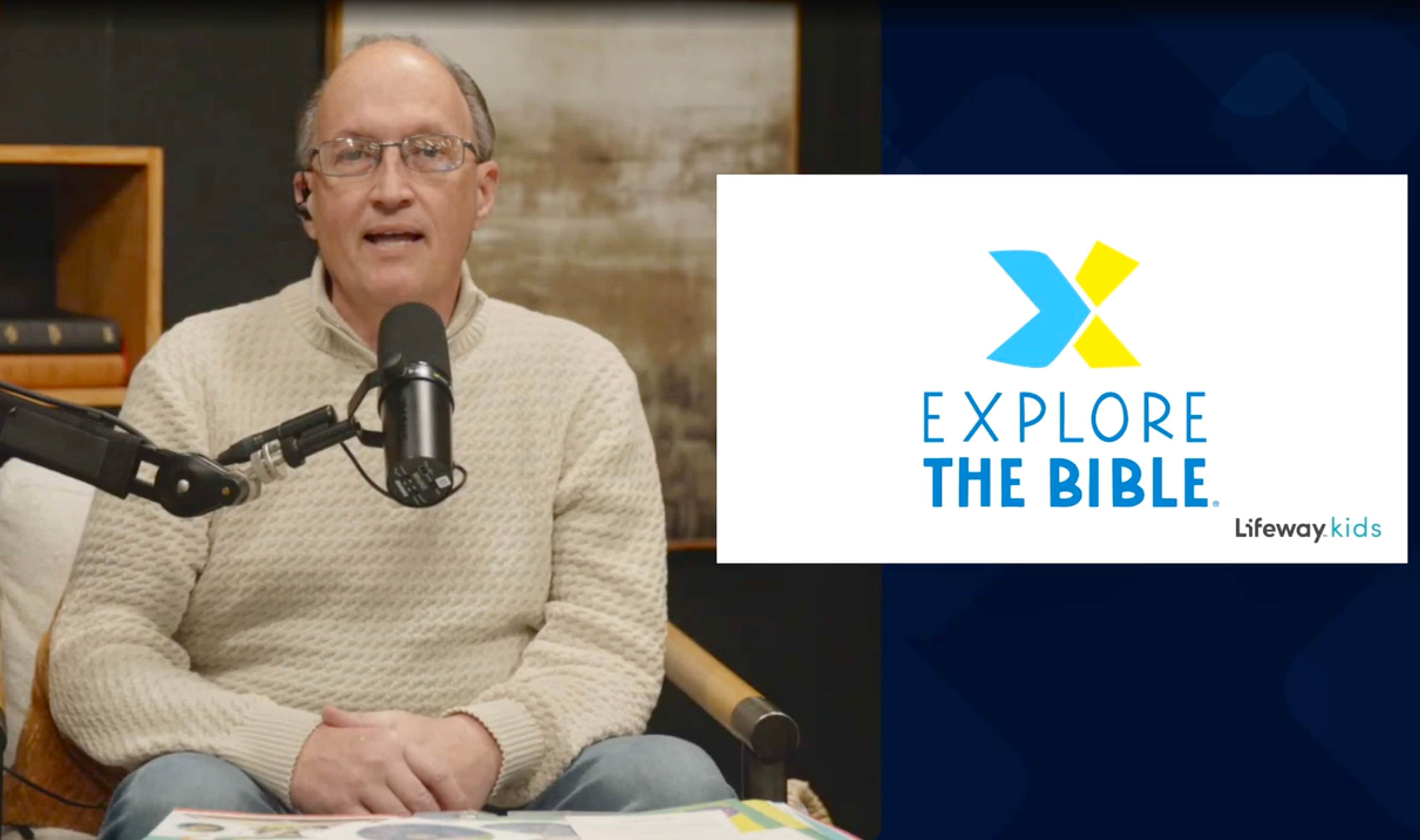 Tim Pollard talking into a podcast mic