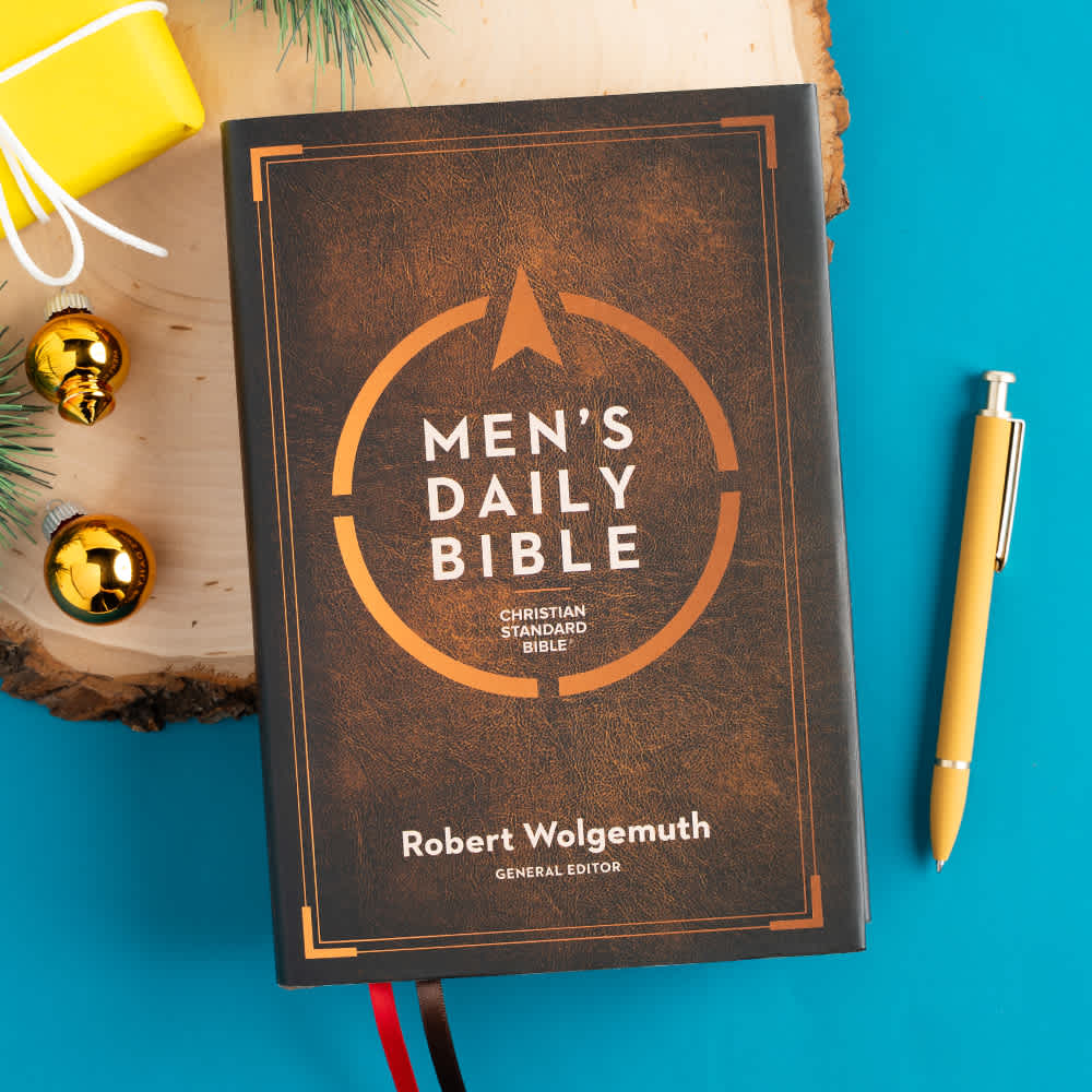 Men's Daily Bible with a Christmas tree