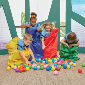 kids doing sack rack and color ball pick up
