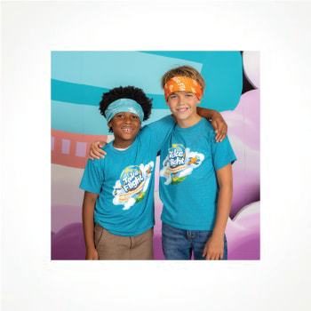 Two children smiling with arms around shoulders