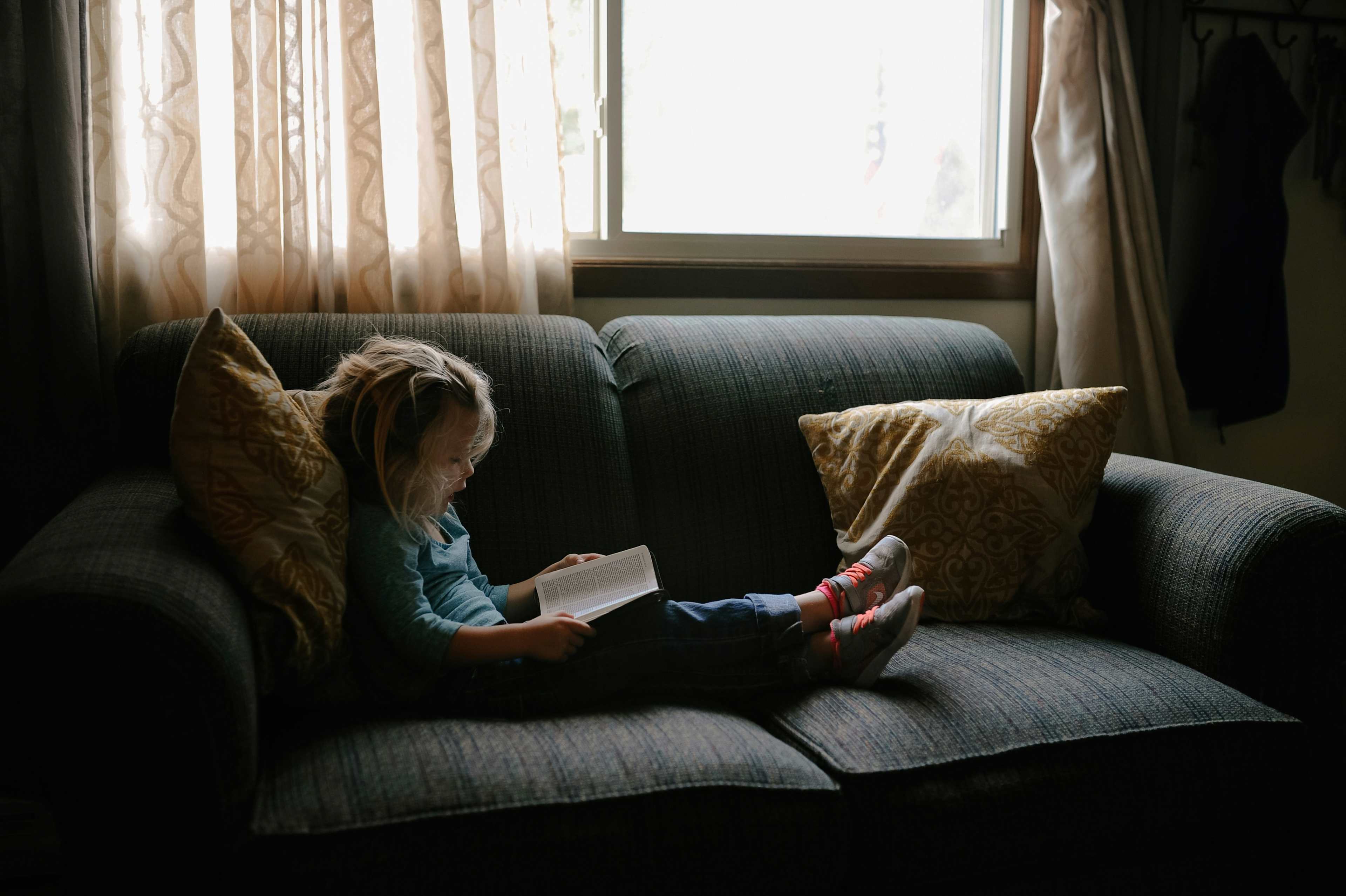 child reading a book