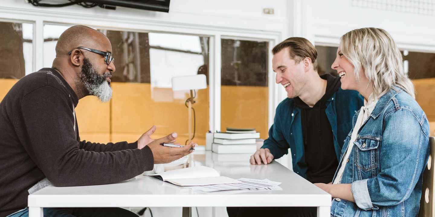 People talking at a table