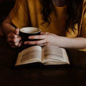 Bible with coffee cup