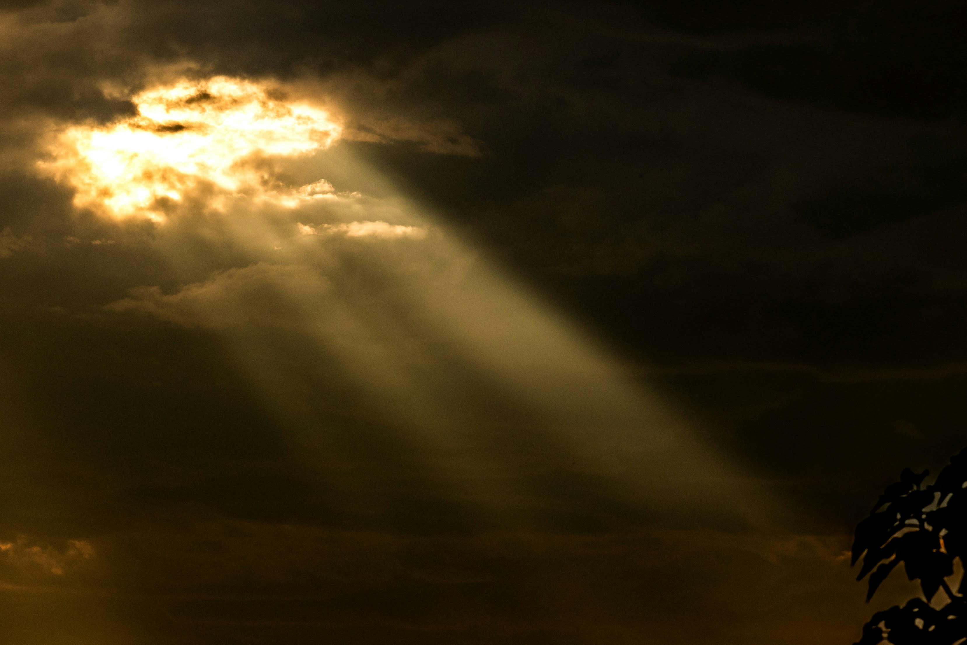 sun peeking through clouds