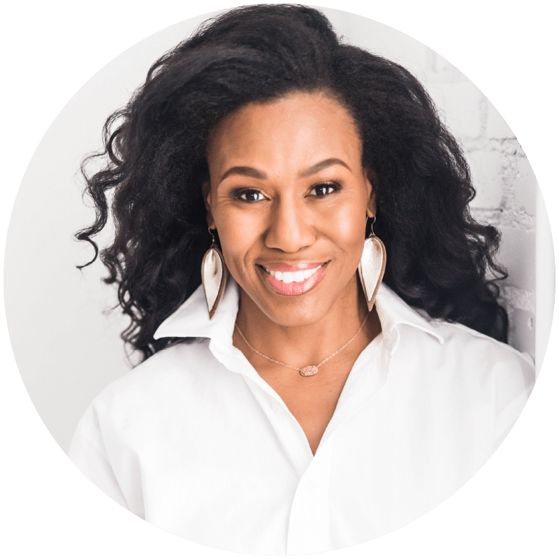 Headshot of a Priscilla Shirer wearing a white collared shirt