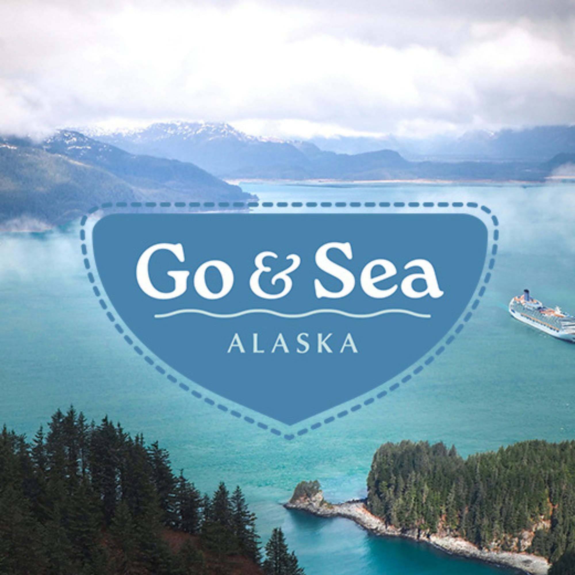 Go and Sea Alaska with cruise ship in water and mountains in background