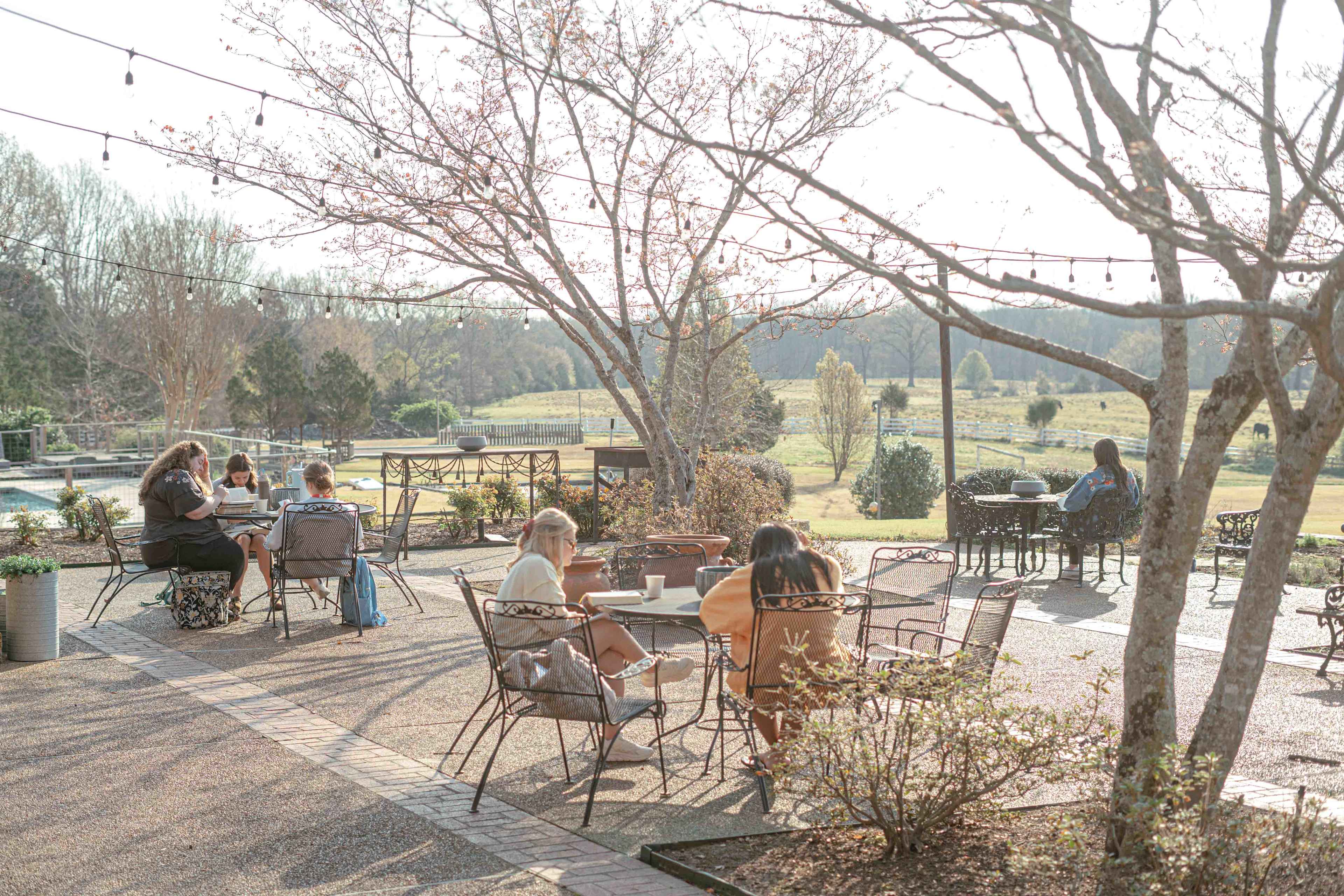 Women sitting on outside patio on a spring day