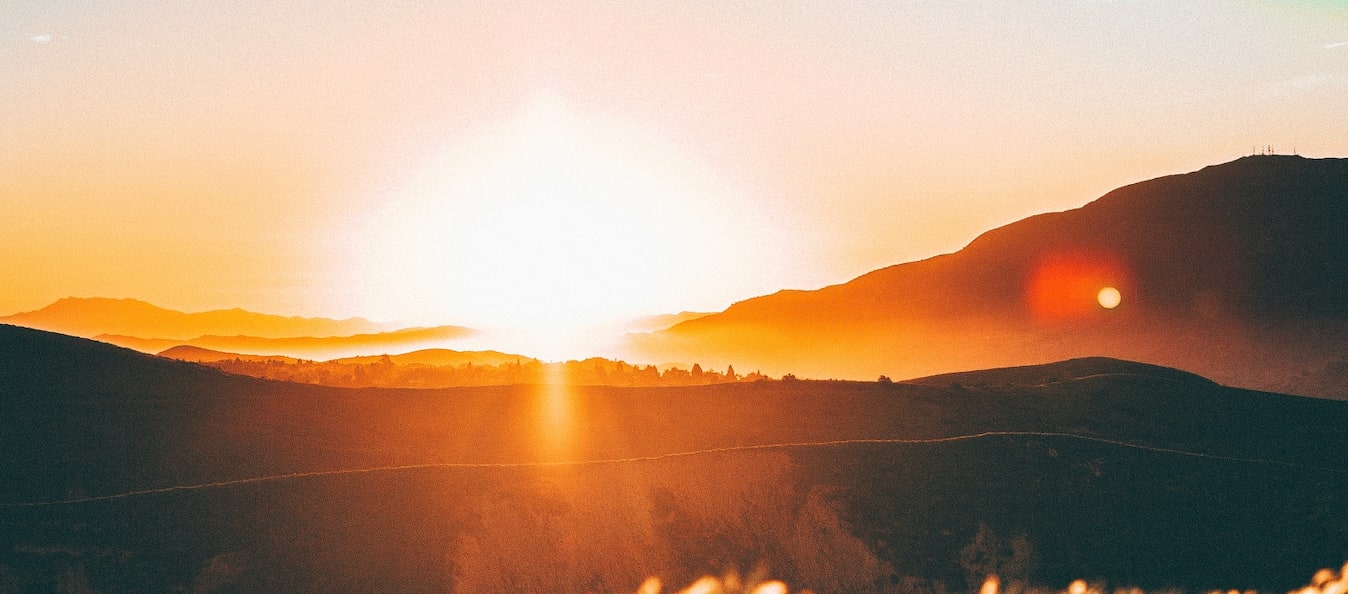 sunrise over a field