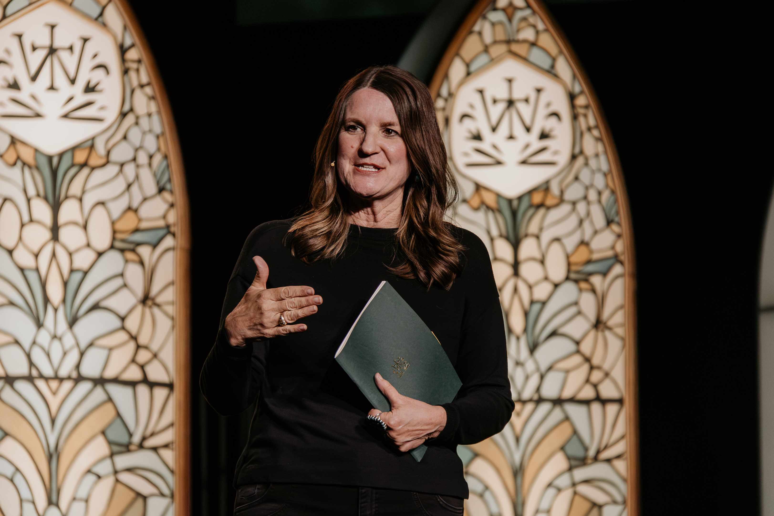 Jen Wiling speaking on stage