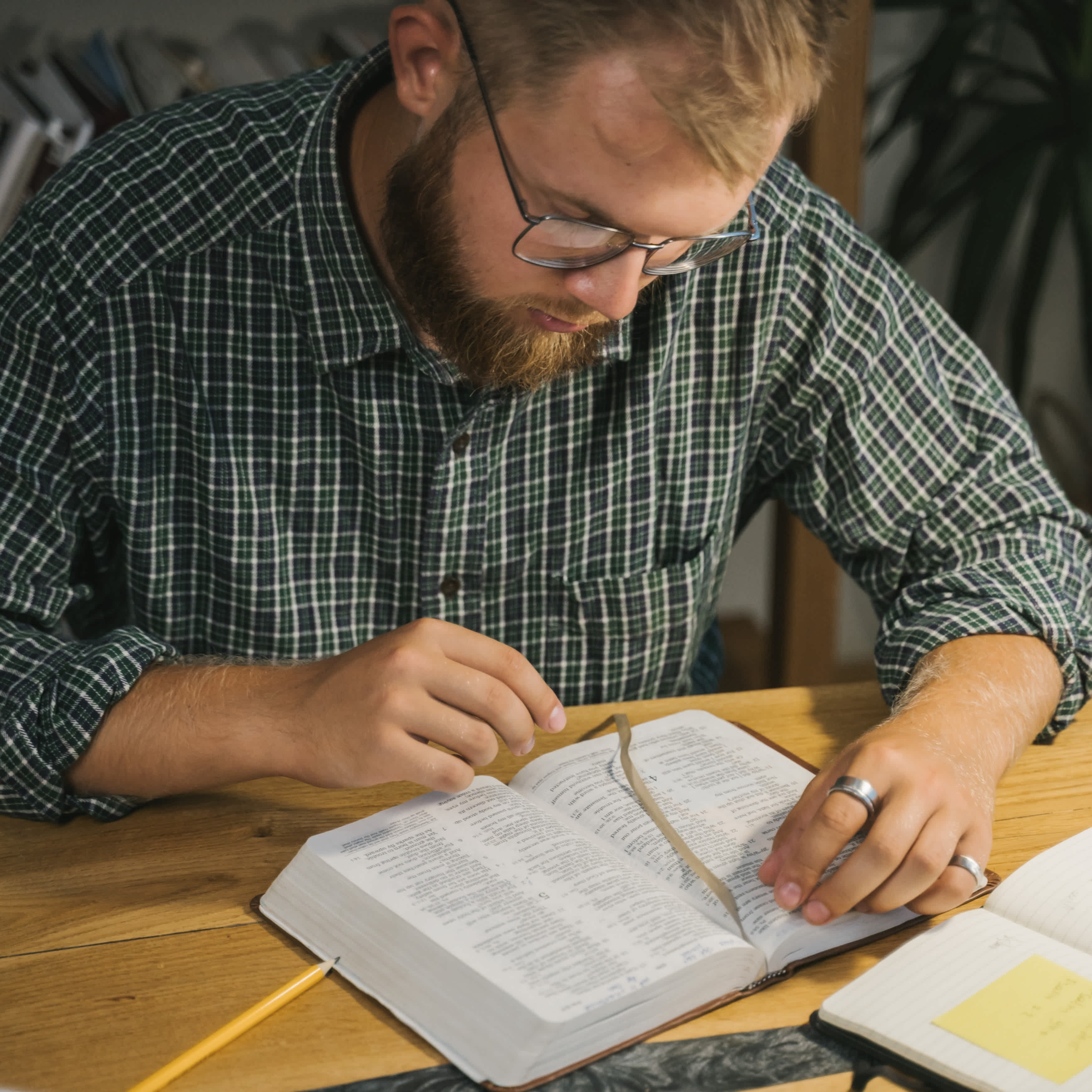 man reading Bible