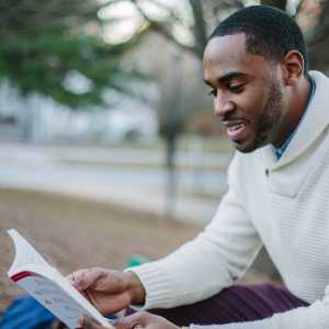 man reading book