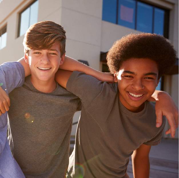 Two Teenage Boys Smiling