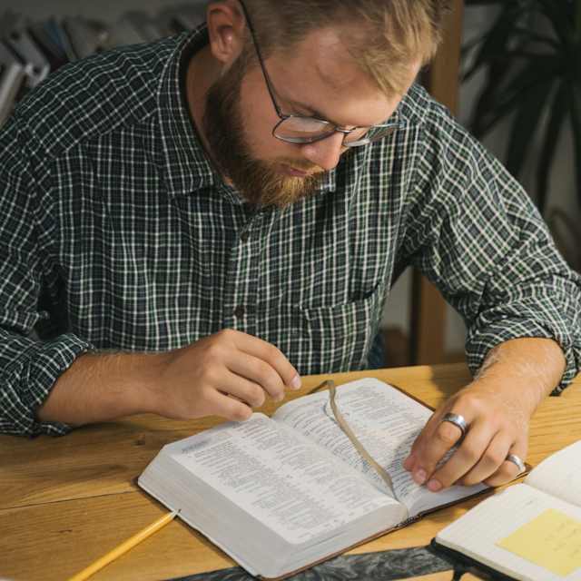 man studying Bible